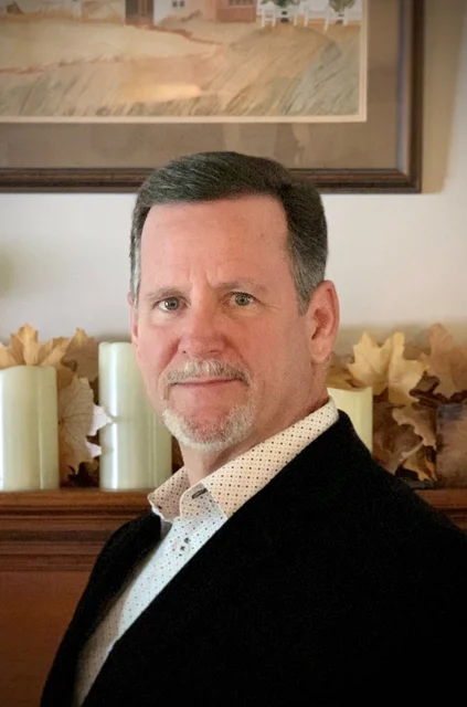 Mr. John F. Guinn, ASA appraiser or business image