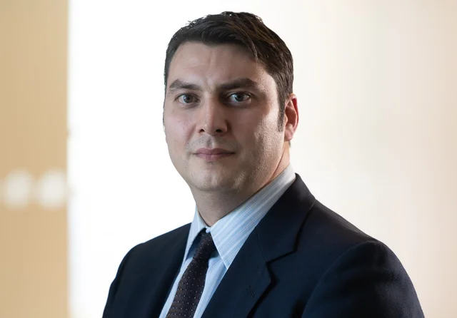 Mr. Christopher J. Gulis, ASA appraiser or business image