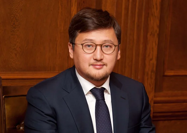Dr. Tolegen Kuandykov, PhD, ASA appraiser or business image