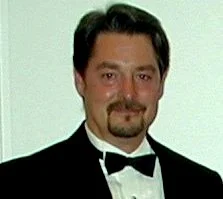Mr. Thomas M. Munizzo, ASA, IFA appraiser or business image
