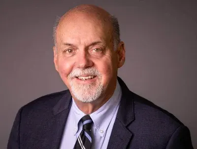 Mr. David G. Clarke, Jr., ASA appraiser or business image
