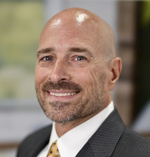 Mr. Dennis L. Badger, AM appraiser or business image