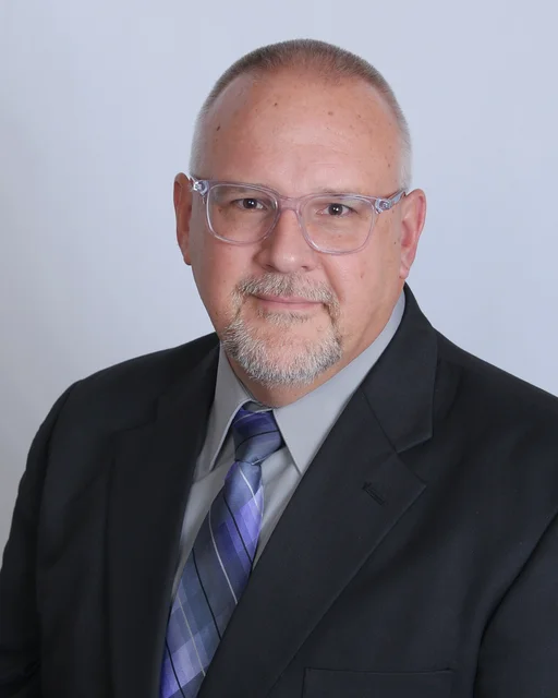 Mr. John M. Thornton, ASA appraiser or business image