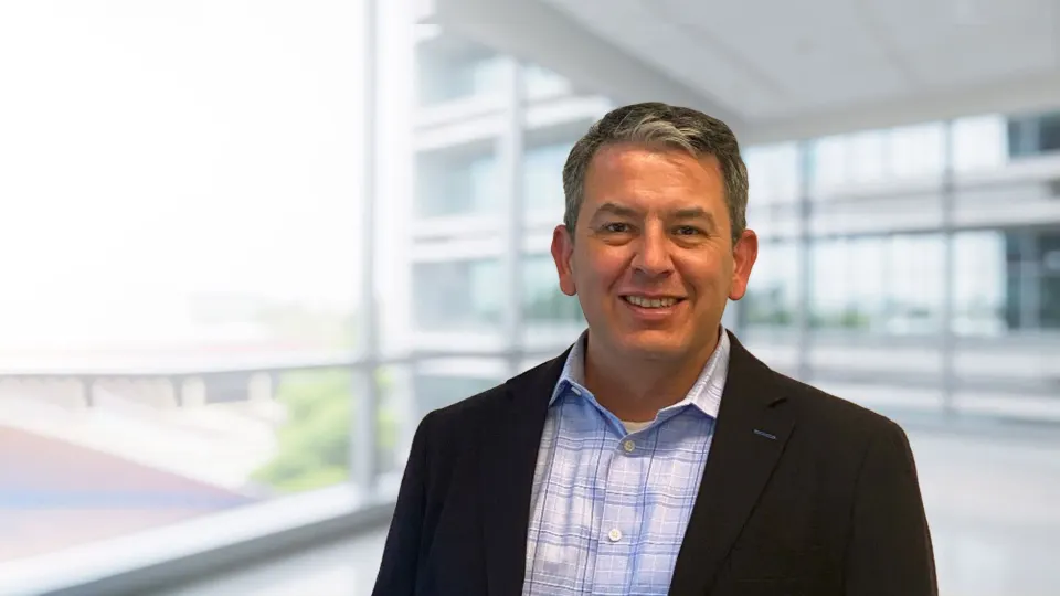 Mr. Greg E. Hisenberg, ASA appraiser or business image
