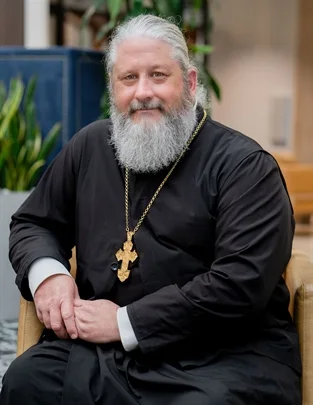 Fr. Jason Foster appraiser or business image